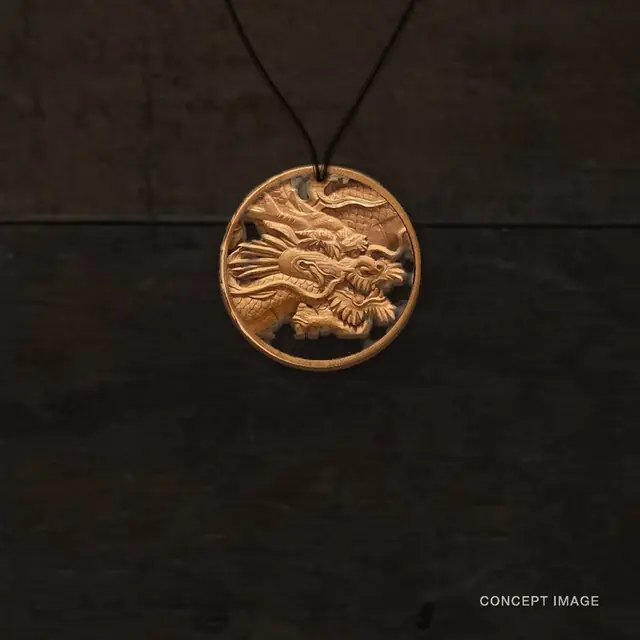 Dragon carved in wood, worn as a round pendant on a cord