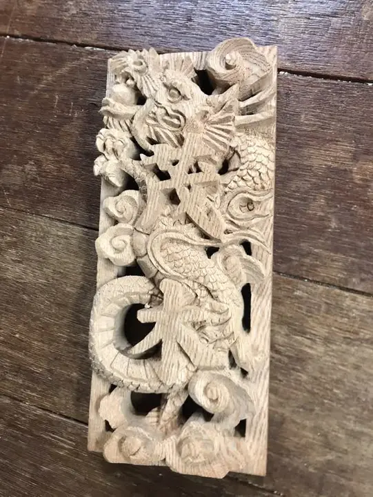 Openwork dragon panel in cedar