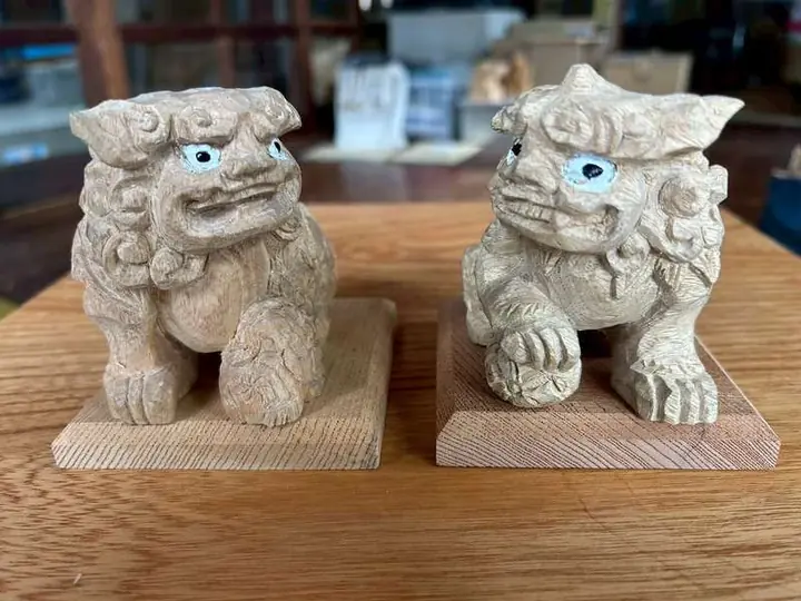 A pair of guardian lions, shishi, facing each other