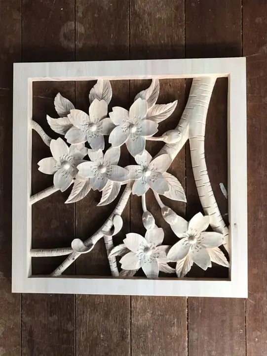 Cherry blossom openwork panel in a light wood frame